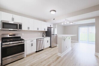 Building Photo - Emerald Gardens