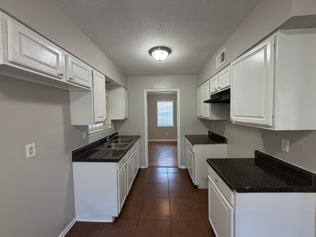 Building Photo - Charming 3BR/1.5BA Bartlett Area Home | Brick Fireplace, Tile Kitchen & Fenced Yard