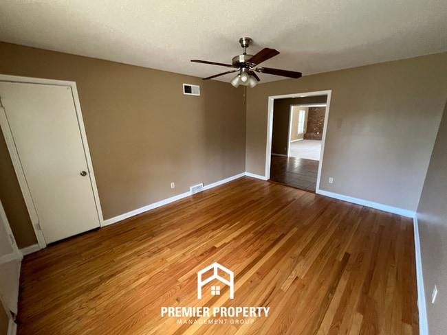 Photo - 3BR/1.5BA Memphis Rental with Tile Flooring, Brick Fireplace & Fenced Yard House