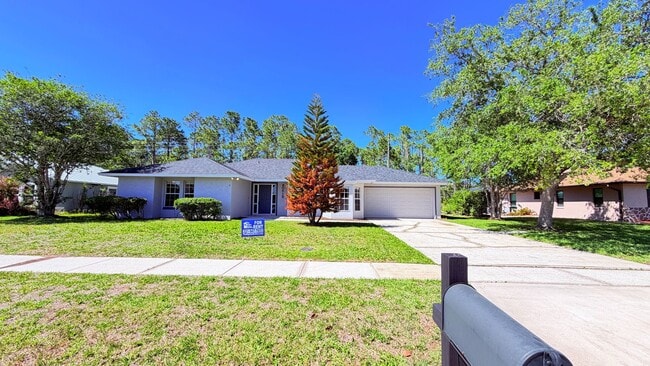 Building Photo - Bright & Spacious 3/2 Home with Huge Yard + Screened Patio — Lawn Care Included!