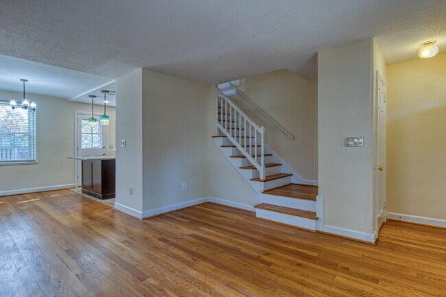 Building Photo - Discover Exceptional Townhouse Living!