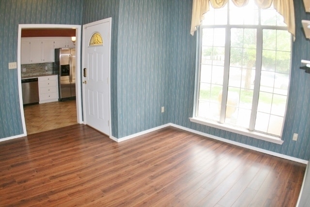 Building Photo - Brick 3 Bedroom Home! Stunning Backyard! M...