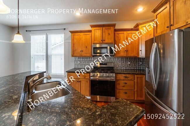 Foto del edificio - 6106 E 14th Ln
