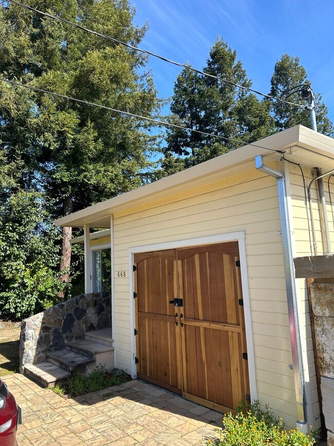 Hand built garage door by owner of property - 668 Benjamins Rd