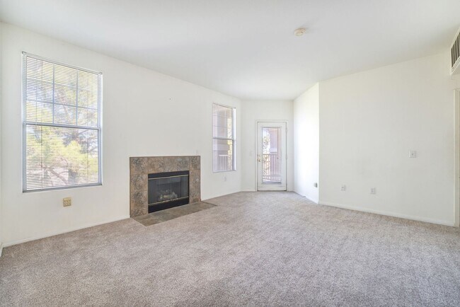 Building Photo - Spacious 3-Bedroom Condo with Garage and T...