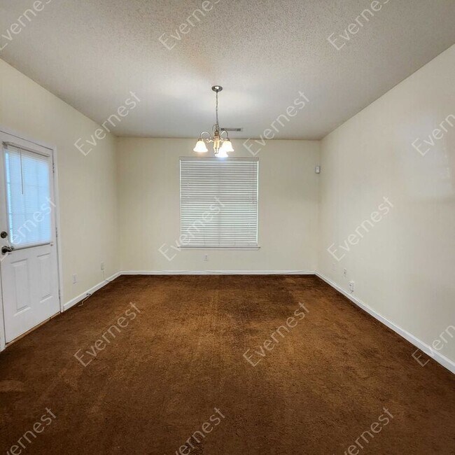 Building Photo - 7688 Creekside Ln