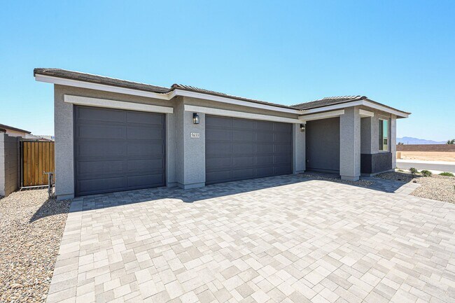 Building Photo - Modern Mountainside Living: Stunning New 4-Bedroom Home in Estrella Crossing! 3 CAR GARAGE!