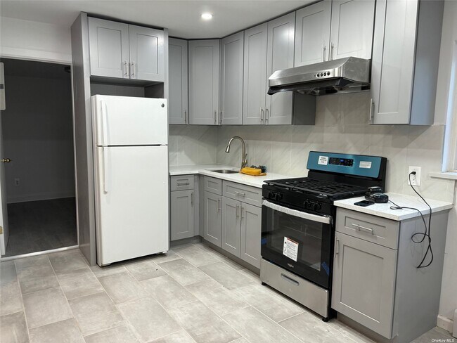 Building Photo - 124-14-124-16 6th Ave