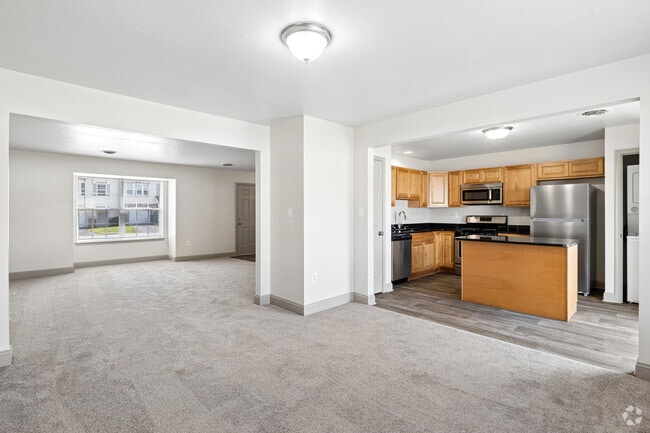 Keryn 3BR, 2.5BA - 1,480SF - Dining Room and Kitchen - Sunpointe Townhomes