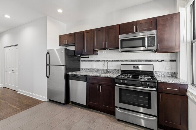 Foto del edificio - 3048 W Leland Ave