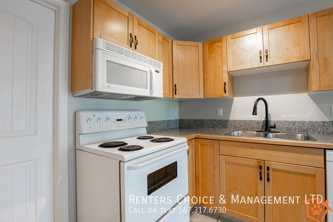 Building Photo - Heritage Heights Condo with Garage & Pet Friendly