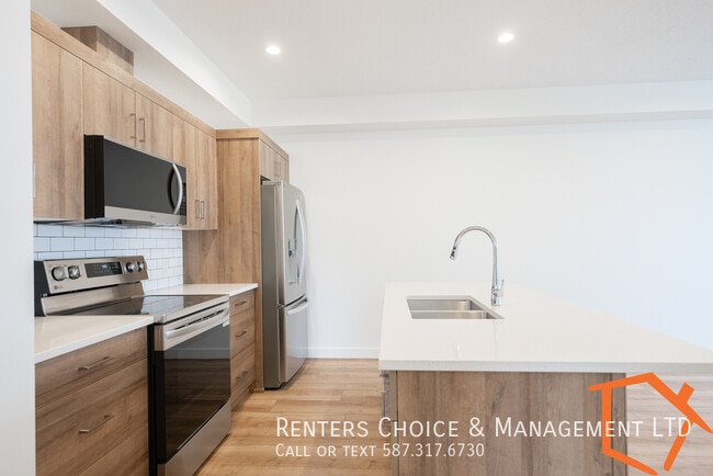 Building Photo - NEW 2 BEDROOM MAIN FLOOR UNIT WITH ASSIGNE...