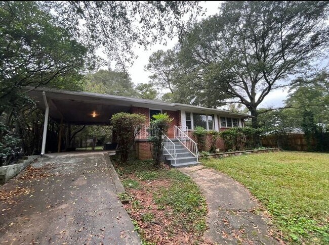 Building Photo - COMING SOON: Classic charm, peaceful living, your Forest Park retreat awaits in this spacious 3-b...
