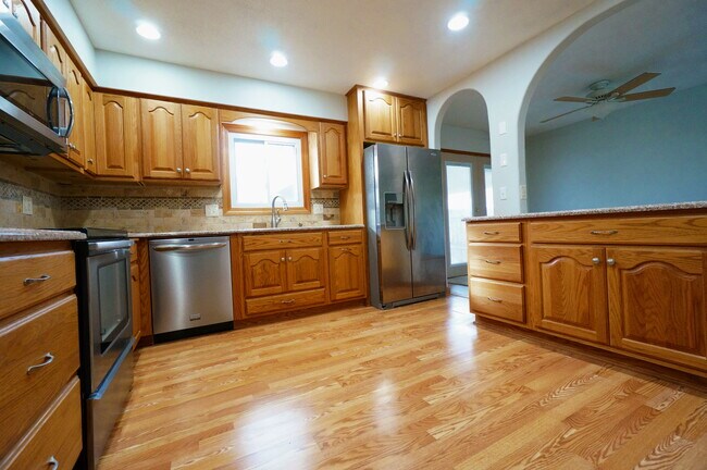 Kitchen with built-in custom made cabinets, pantry, soft close and newer SS appliance - 12821 Westwood Ln