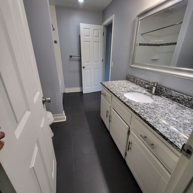 Building Photo - Spacious 3-Bedroom Twin Home in Prime Eden...