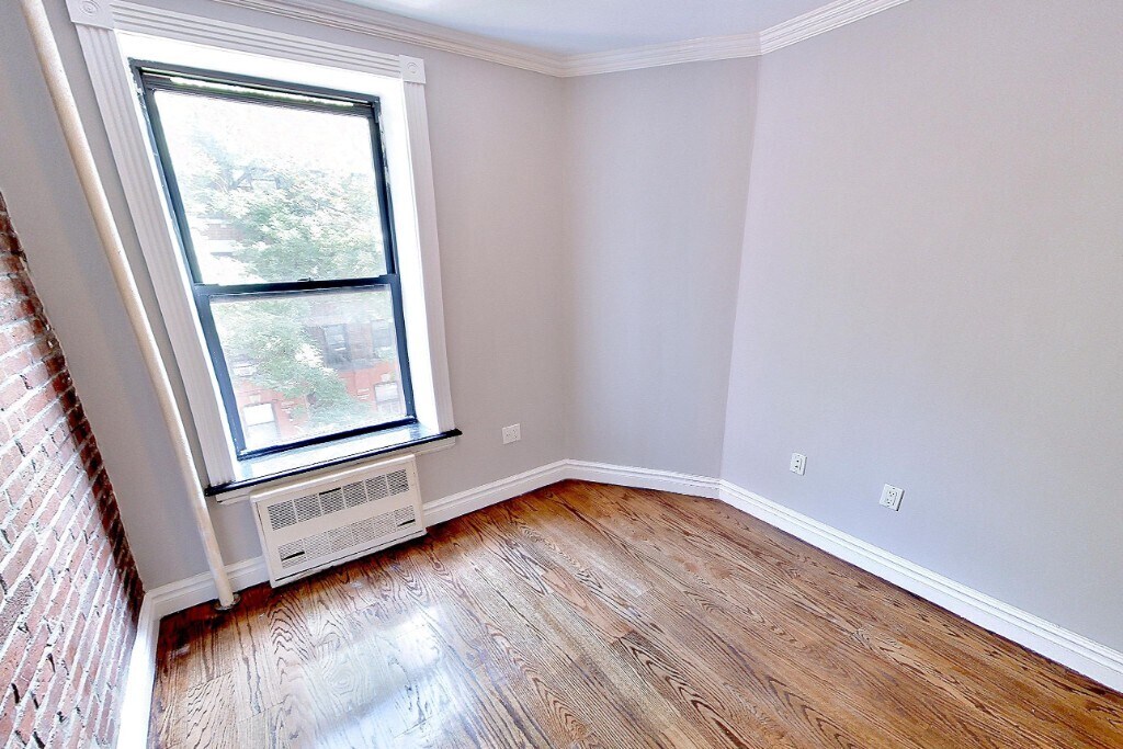 Foto del edificio - 420 E 9th St