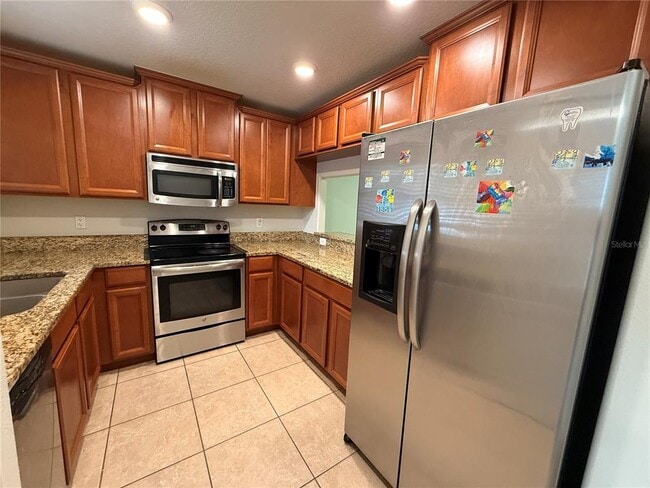 Foto del edificio - 9854 Trumpet Vine Loop