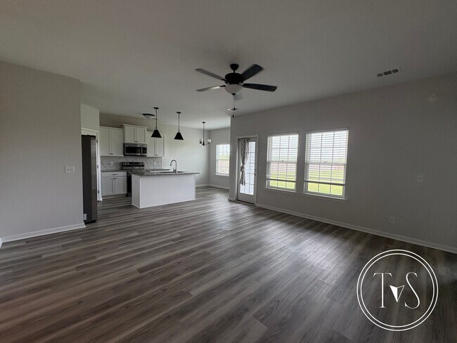 Building Photo - The perfect blend of modern living and small-town charm
