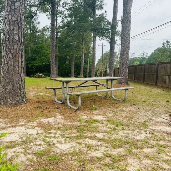 Building Photo - Welcome to YOUR new home at Pine Shadows Duplex Apartment Homes!