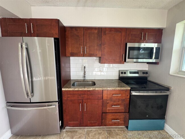 Building Photo - 1700 NW 52nd Ave