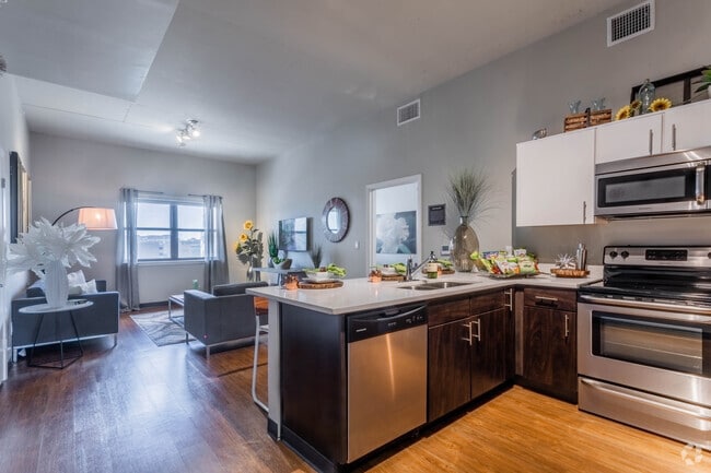 Living Room and Kitchen - The Rise at Northgate Apartments