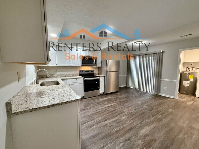 Foto del edificio - 2 Bedroom Condo with Private Patio