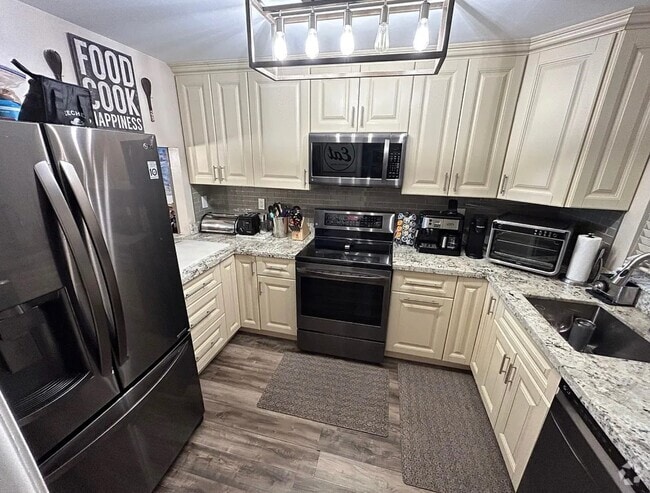 Building Photo - 9410 Tangerine Pl