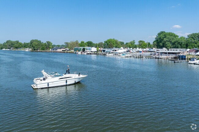 Boaters enjoy the weather on Little Calumet River in Burnham.