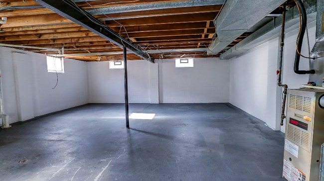 clean open basement with washer/dryer - 717 Newport Pl