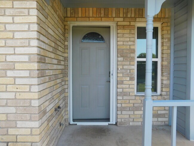 Front Entrance with pocket screen door and a nice patio - 2216 Cimmaron Dr