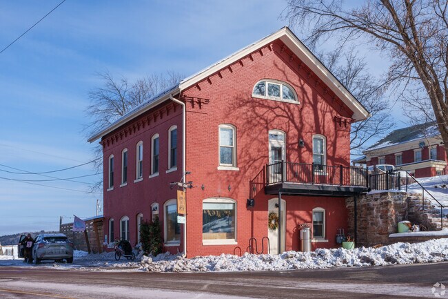 The Arrowhead Lodge and b's Tiny Cafe share the same location in this beautiful red brick building in Milton.