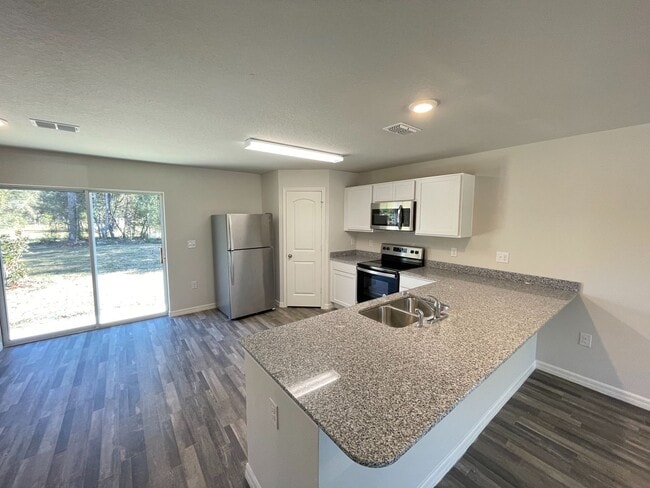 Building Photo - Poinciana Village-1630 Tench Ct Poinciana, FL 34759