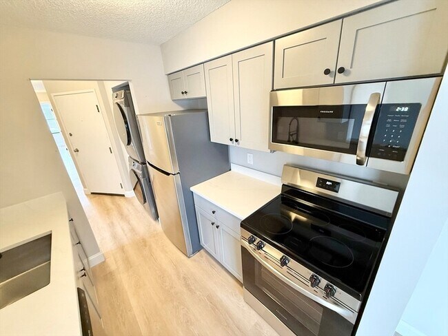 Building Photo - 59--69 Msgr Patrick j Lydon Way Unit 306