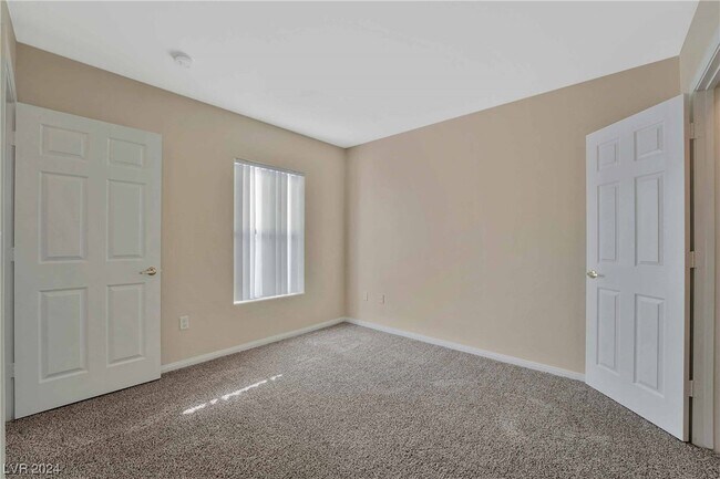 Building Photo - 8000 W Badura Ave