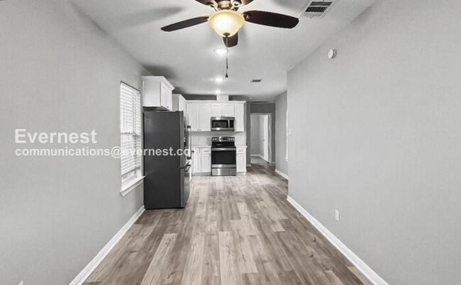 Foto del edificio - 2 Bed/1 Bath Condo with Fenced Yard / Pet-Friendly / Vouchers Accepted / Available Now!