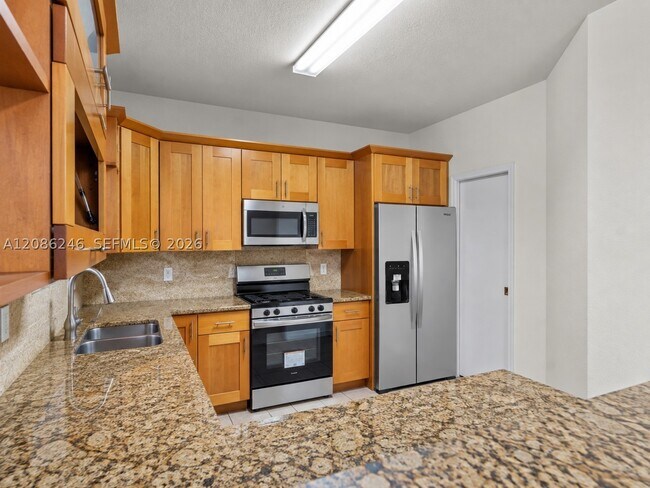 Foto del edificio - 4401 NW 113th Ct