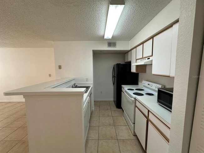 Building Photo - 2210 Grand Cayman Ct