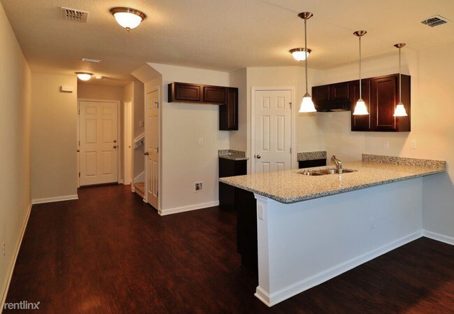Building Photo - 8429 McGirts Village Ln
