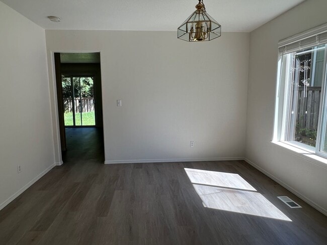 Building Photo - 8573 NE Hodes Street ~ Beautifully Refresh...
