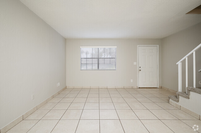 2 BR, 1.5 BA - 1050 SF - Living Room - The Palms at Daytona