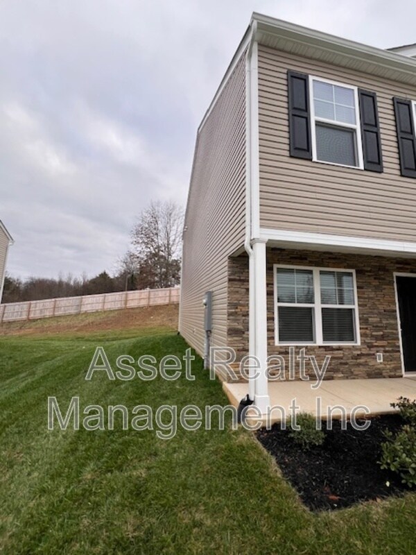 Building Photo - 305 Aspen Dr