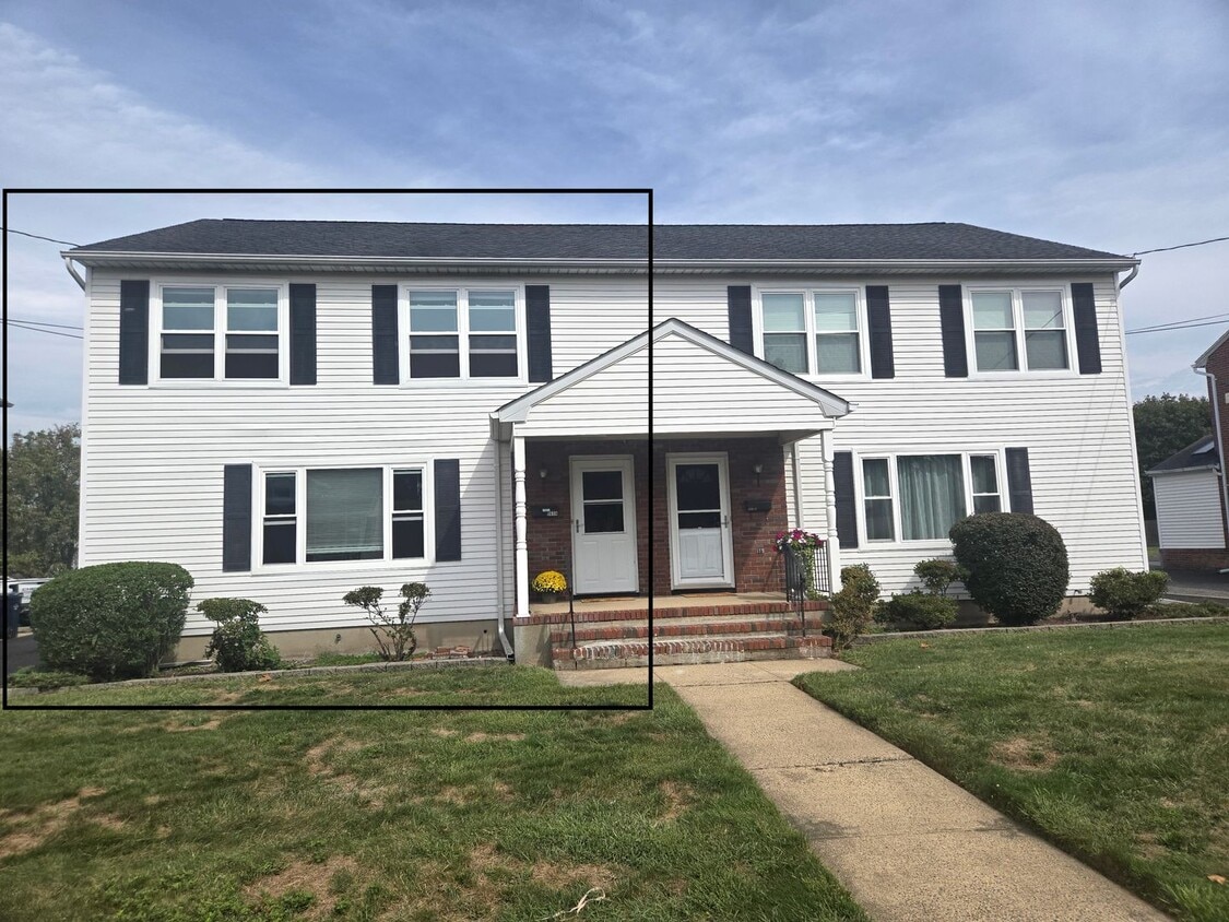 Primary Photo - Updates abound at this SPACIOUS, half dupl...