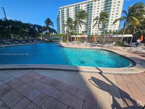 Building Photo - 19380 Collins Ave