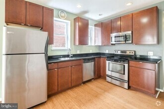 Building Photo - 5035 Walton Ave
