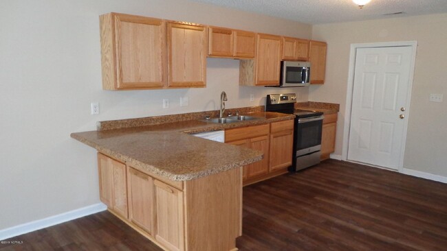Building Photo - Adorable, well maintained 2 bedroom 2 bath...