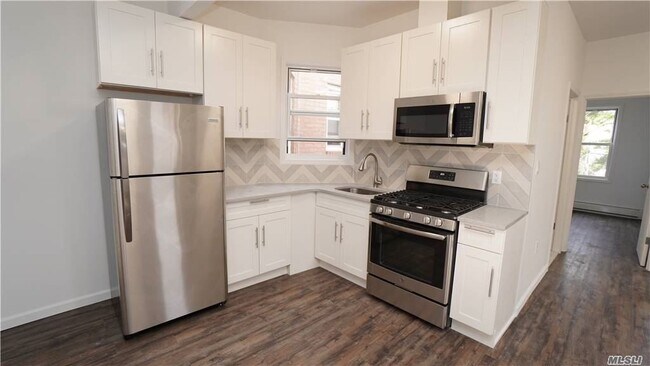 Building Photo - 51-59-59 47th St