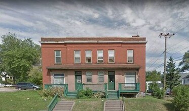 Building Photo - 120-122 N 12th Ave E