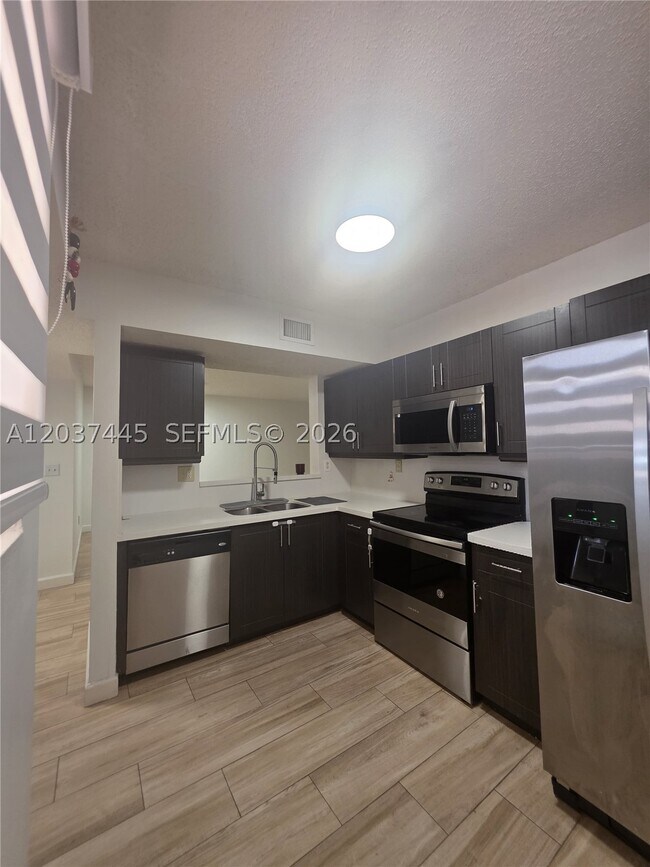 Building Photo - 15711 SW 137th Ave