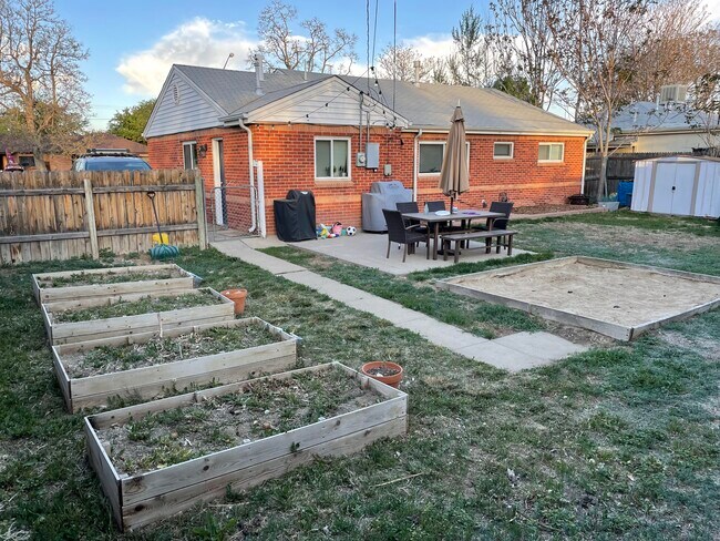 Backyard, raised garden beds/patio - 9291 High St