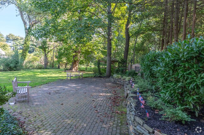 The gardens and memorial at Pearsall Park in Amityville.